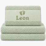 pastel mint colored towel with name embroidered
