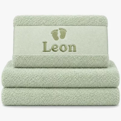 pastel mint colored towel with name embroidered