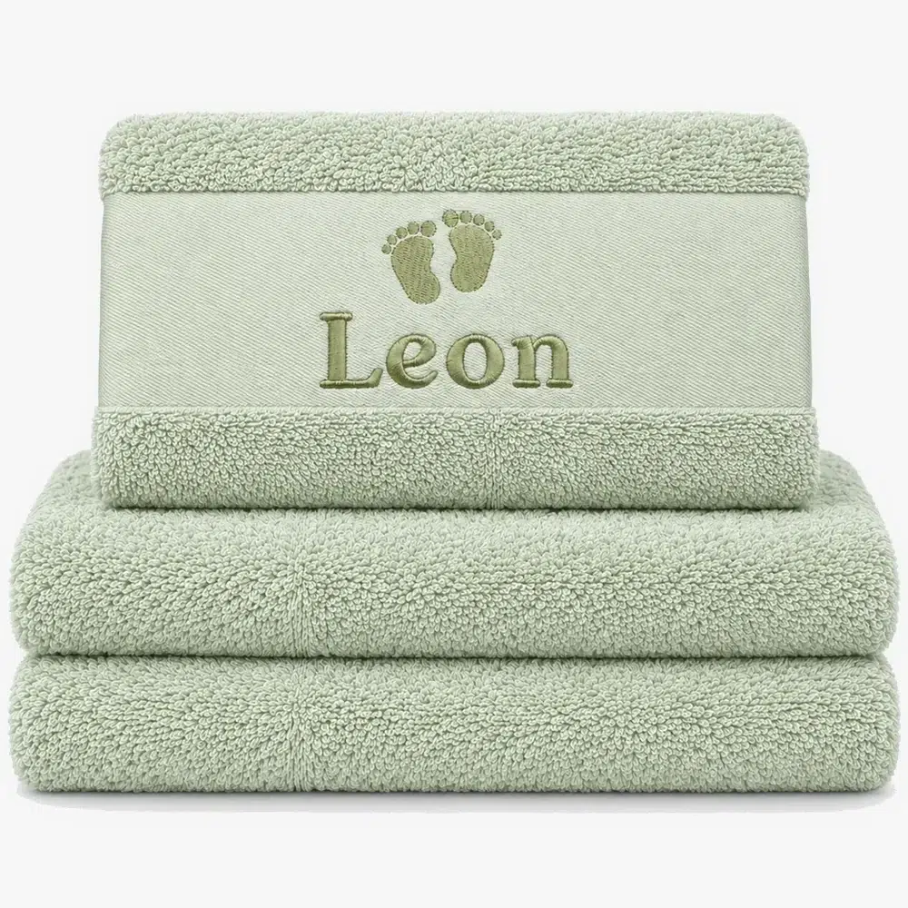 pastel mint colored towel with name embroidered